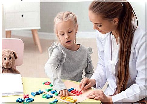 A little girl at the speech therapist to improve her language