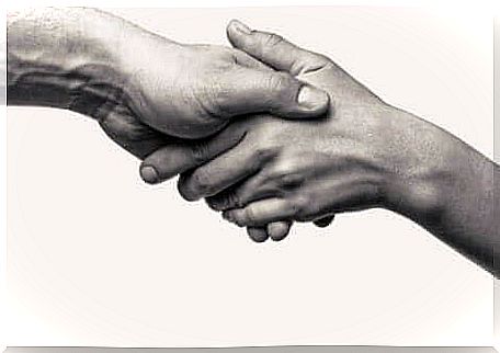 An illustration depicting a handshake. 