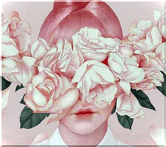 woman with flowers on face