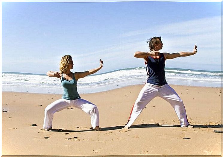 Couple practicing qi gong.